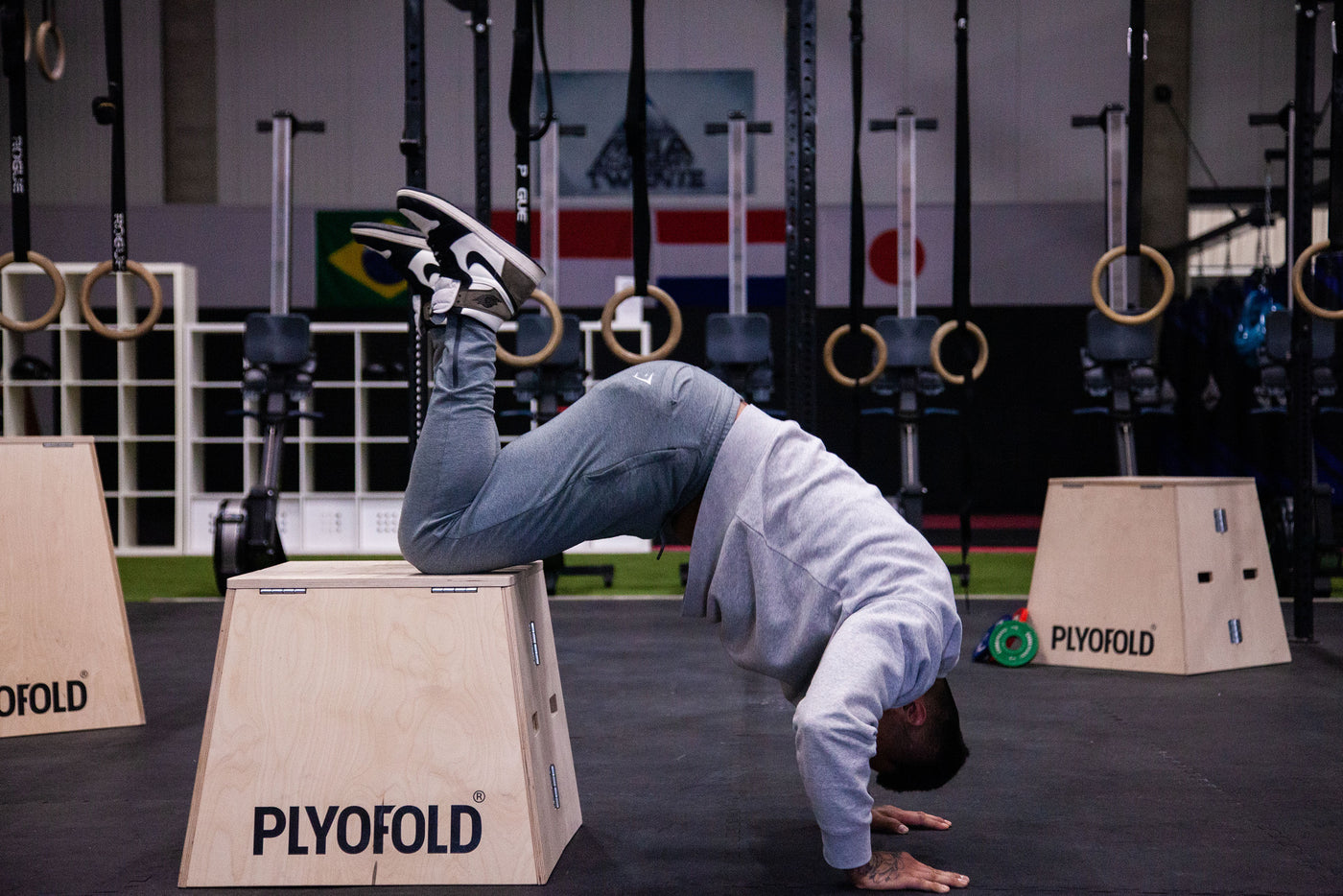 Athlete performing pike pushup in 10x10 challenge